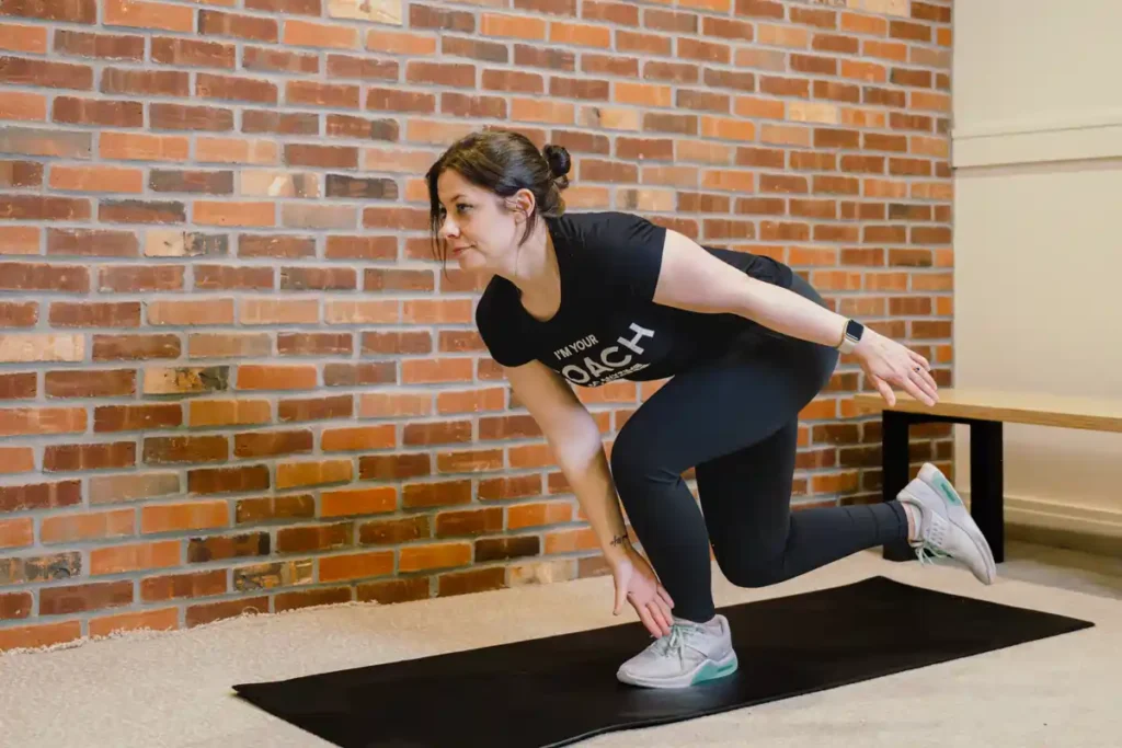 Tone Your Arms in Just One Week: Achieve Results Without the Gym! 1 A person exercising their arms at home with light weights Chigwell