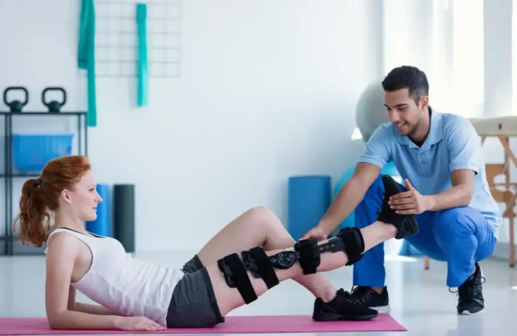 Woman having treatment to help muscle recovery Chigwell after an injury