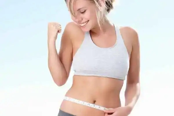 Unraveling the Mystery: Where Does the Body Fat Loss From First? 3 Image of woman happy with fat loss Chigwell