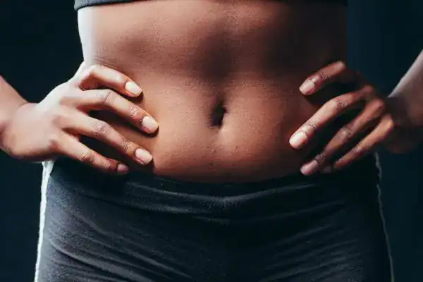 Toning Your Stomach: The Ultimate Guide to Achieving a Sculpted Stomach While Shedding Pounds 1 Image of a toned stomach after non surgical treatment Chigwell